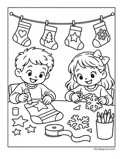 A boy and a girl cutting and coloring paper stockings at a table, with a stocking garland, scissors, crayons, ribbon and snowflake cutouts