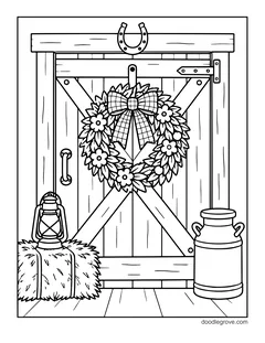 A wreath with flowers and a plaid bow on a barn door, with a horseshoe, a lantern, a hay bale and a milk can