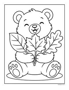 A smiling bear sitting down and hugging a bunch of maple and oak leaves