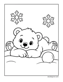 A polar bear cub lying on the snow with its head on its paws, next to a snowball, with snowflakes