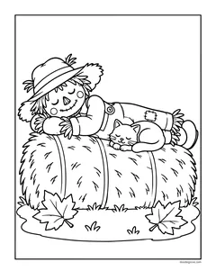 A scarecrow sleeping on top of a hay bale with a kitten curled up beside it, and autumn leaves